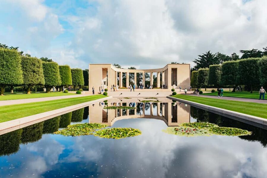 Paris: Normandy D-Day Sites Guided Day Trip with Lunch - A Norman lunch at Grandcamp-Maisy