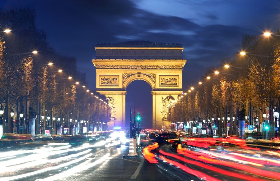 Paris: Panoramic Night Tour with Audio Guide and Host - Paris after dark from an open-top coach