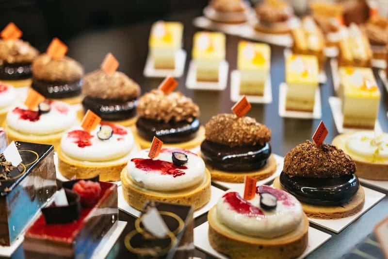 Paris: Saint Germain des Prés Guided Foodie Walking Tour - Three sweet stops, from pastry to chocolate