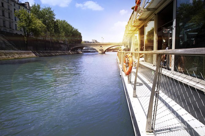 Paris Seine River Sightseeing Cruise with Commentary by Bateaux Parisiens - Boarding beneath the Eiffel Tower