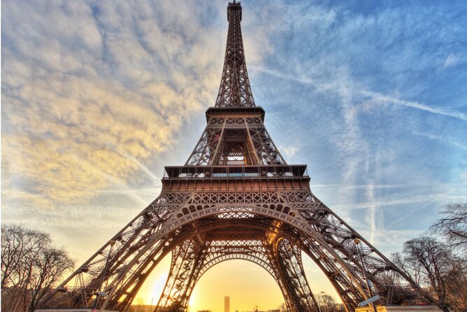 Paris: Seine River Sightseeing Sunset Cruise with Champagne - Île de la Cité and Notre-Dame from the water