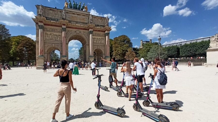 Paris: Small-Group E-Scooter Tour with a Local Guide - The Louvre courtyard and Pyramid
