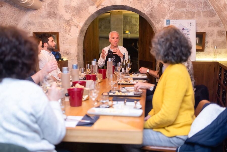 Paris: The Ultimate Wine and Cheese Tasting in English - Inside the Les Caves du Louvre tasting room
