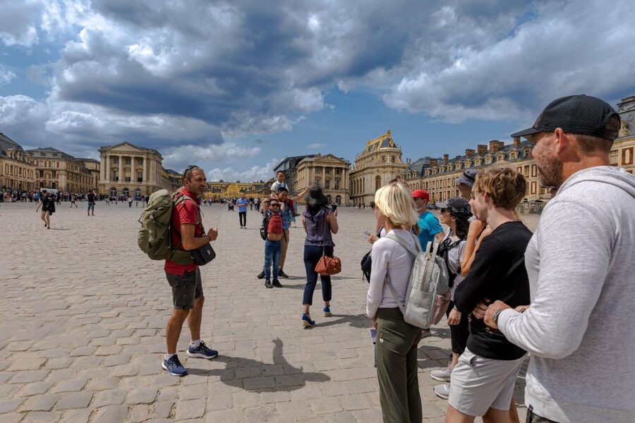 Paris: Versailles Palace and Queen Hamlet E-Bike Tour - Bikes, weather, and group pace