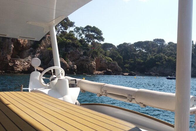 Private ride with sea bath in Solar Catamaran - Cap d’Antibes, cliffs, and clear water