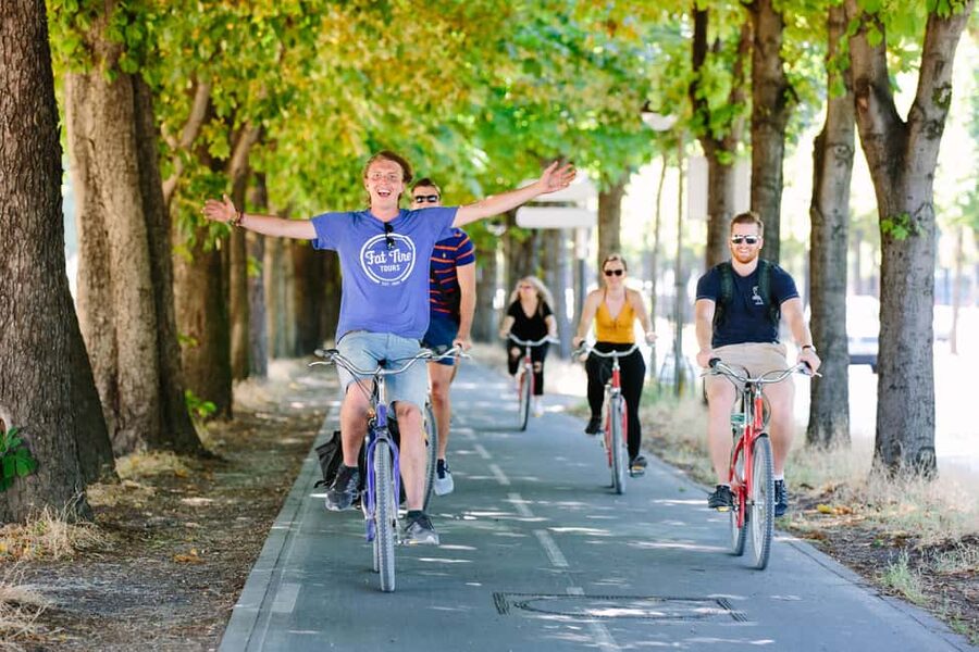 Private Secrets of Paris Bike Tour - Walls, cannon fire, and layered Paris