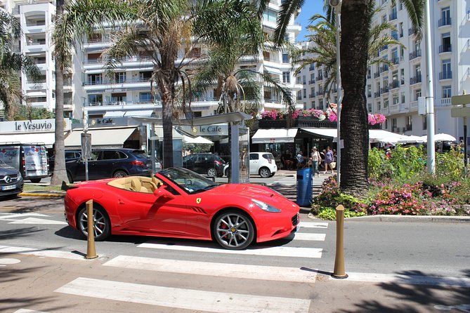 Private Tour on the Roads of Cannes by Ferrari - Beach views toward the Lérins Islands