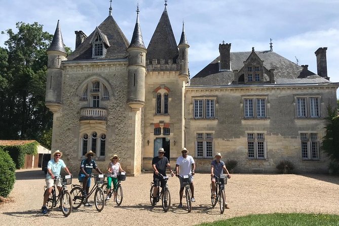 Saint-Emilion Small-Group Electric Bike Wine Tour Tastings & Lunch from Bordeaux - Riding an e-bike through Saint-Émilion wine country