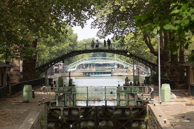 Seine River Cruise and Paris Canals Tour - The Seine section: Louvre, Notre-Dame, and Île Saint-Louis