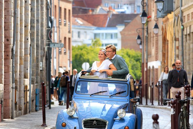 Unique Tour of Lille by Convertible 2CV - 1h00 - Porte de Paris and Place de la République