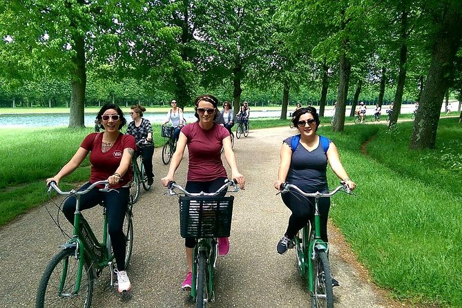 Versailles Domain Bike Tour with Palace Entry by Train from Paris - Cycling through the royal gardens