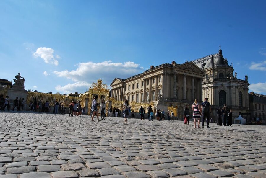 Versailles: Palace Guided Tour with Skip-the-Line Ticket - Entering the palace through the group entrance
